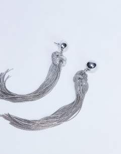 Model wearing Perl tassel earrings in silver