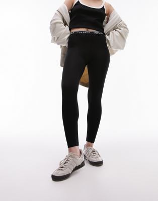 branded elastic legging in black