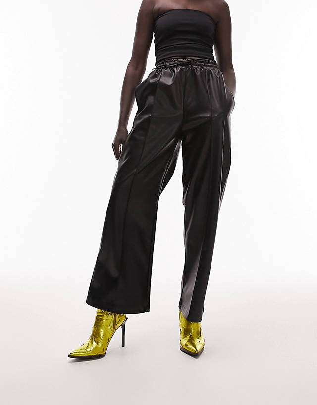 Topshop Petite - faux leather jogger style straight leg trouser in black