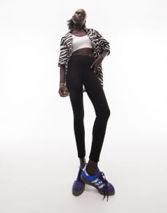 Model wearing Petite full length heavyweight legging with deep waistband in black