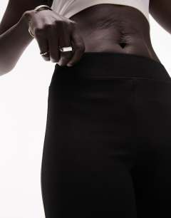 Model wearing Petite full length heavyweight legging with deep waistband in black