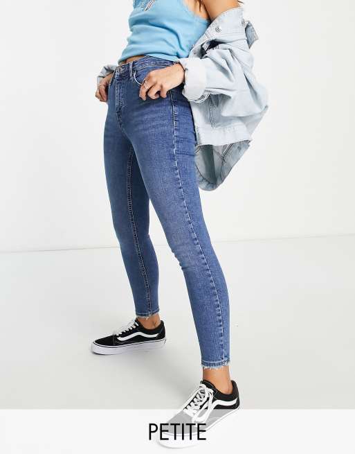 Topshop Petite high rise Jamie jeans with abraided hem detailing in mid blue