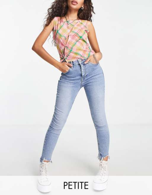Topshop Petite high rise Jamie jeans with jagged hem detailing in bleach 