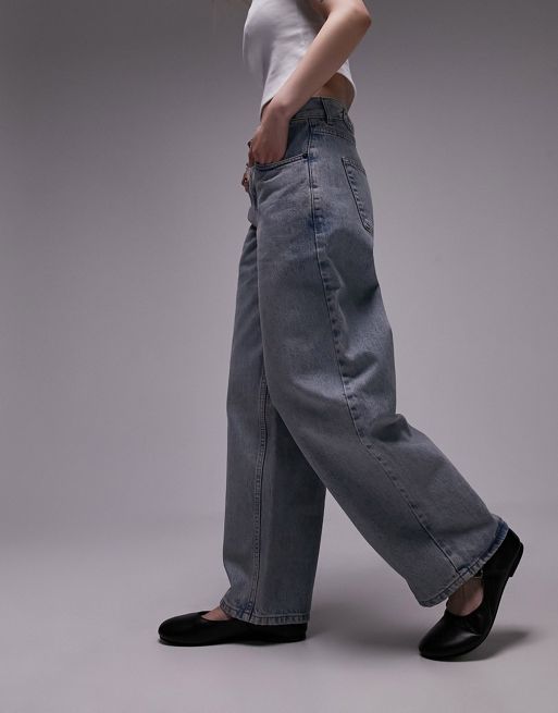 Topshop Petite - Jeans a vita bassa con cinturino sul retro effetto candeggiato vintage 