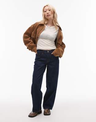 Topshop Petite - Jeans in unbehandeltem Indigoblau mit niedrigem, elastischem Bund