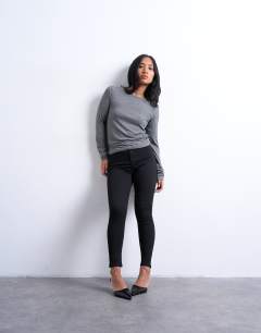 Model wearing Joni high rise super skinny jean in black