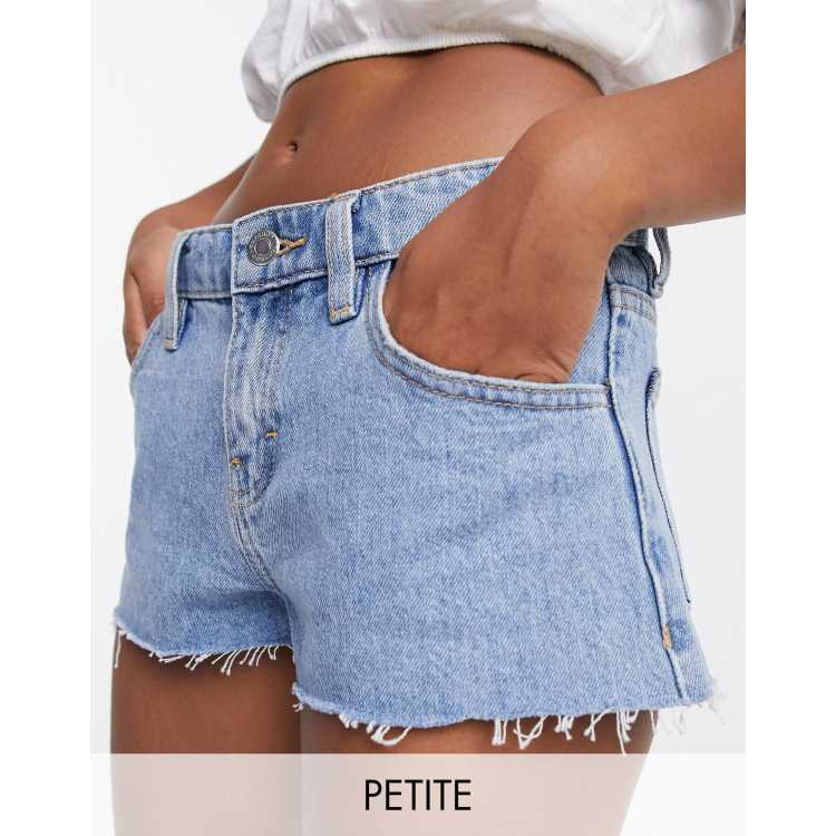 Topshop Petite low rise denim shorts in mid wash