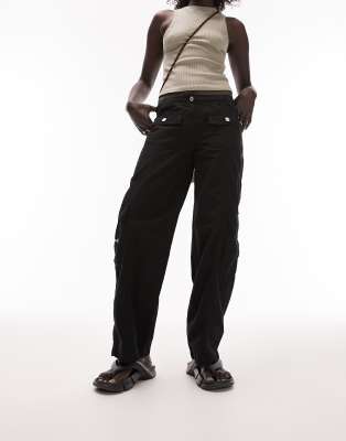 low rise slim fit cargo pants in washed black