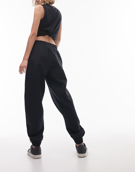 Topshop Petite oversized cuff jogger in washed black ASOS