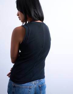 Model wearing Petite slim tank in black
