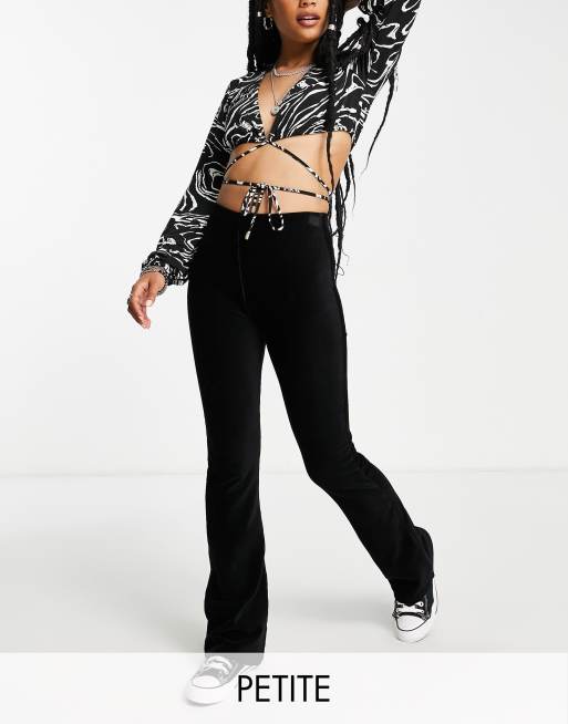Topshop Petite stretchy cord flared pants in black