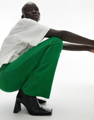 Topshop Petite stretchy velvet cord flared trouser in green