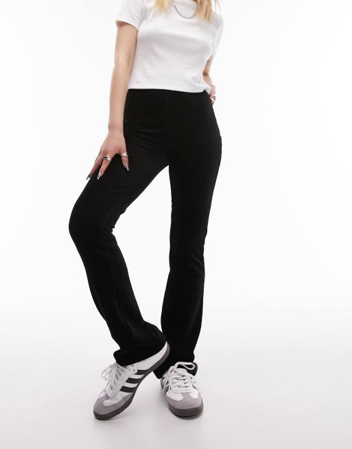 Topshop Petite stretchy velvet cord flare pants in black ASOS