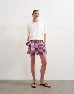 Model wearing Pink and purple stripe boxer short in pink