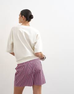 Model wearing Pink and purple stripe boxer short in pink