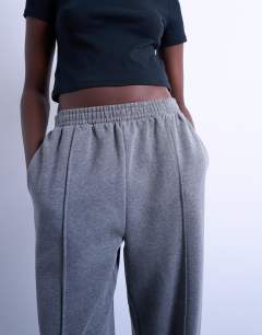 Model wearing Pintuck cuffed jogger in dark grey marl