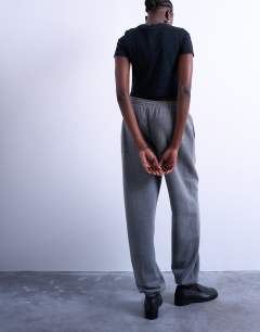 Model wearing Pintuck cuffed jogger in dark grey marl