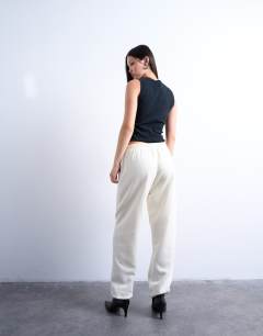 Model wearing Pintuck cuffed jogger in ecru