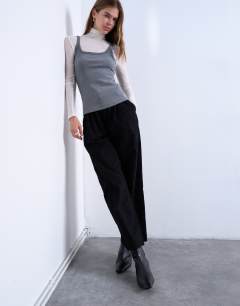 Model wearing Pintuck waist cropped trouser in black