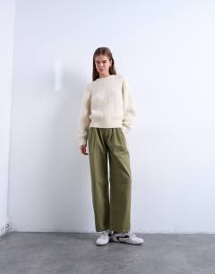 Model wearing Pintuck waist cropped trouser in green