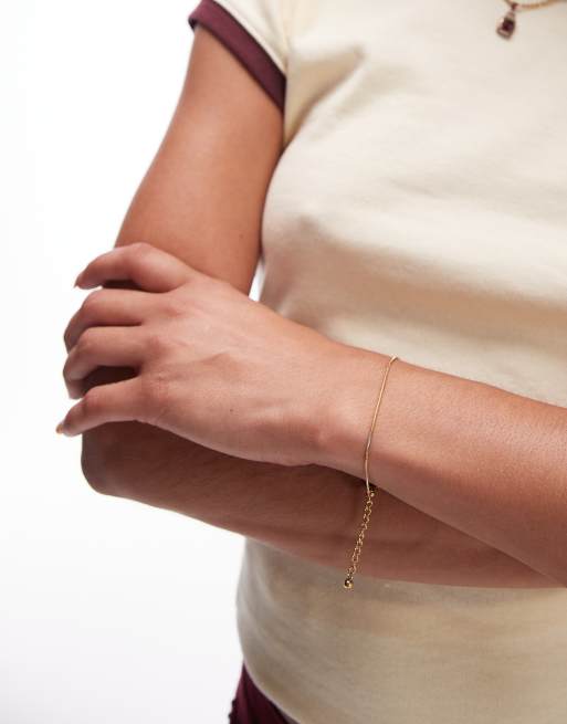 Topshop – Pip – Goldfarbenes Schlangenarmband aus wasserabweisendem Edelstahl
