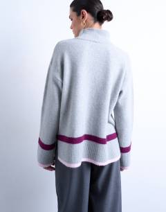 Model wearing Placement stripe jumper in grey