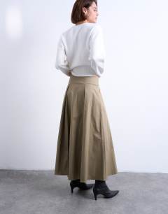 Model wearing Pleat front midi skirt in stone