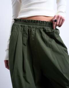 Model wearing Pleated balloon jogger with elasticated waist in green