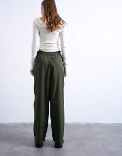Model wearing Pleated balloon jogger with elasticated waist in green