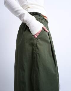 Model wearing Pleated balloon jogger with elasticated waist in green