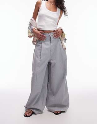 pleated extreme wide leg jeans in chalky blue