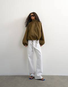 Model wearing Pleated funnel neck anorak in khaki