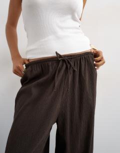 Model wearing Plisse balloon trouser in chocolate