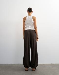 Model wearing Plisse balloon trouser in chocolate