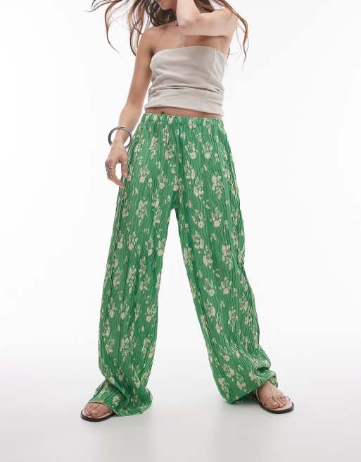Topshop - Plissé broek met wijde pijpen van kreukelstof met bloemenprint in groen
