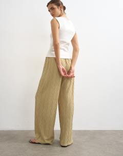 Model wearing Plisse jersey wide leg trouser in khaki
