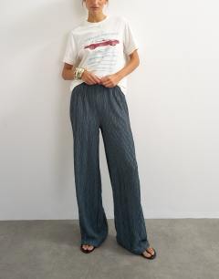 Model wearing Plisse jersey wide leg trouser in slate