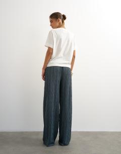 Model wearing Plisse jersey wide leg trouser in slate