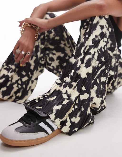 Topshop plisse wide leg pants in blurred animal print