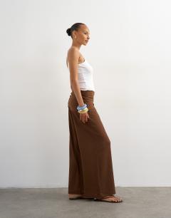 Model wearing Plisse wrap scarf detail trousers in chocolate