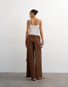 Model wearing Plisse wrap scarf detail trousers in chocolate