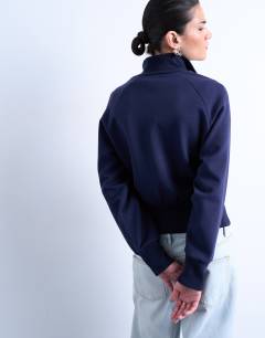 Model wearing Pocket detail funnel neck sweat in navy