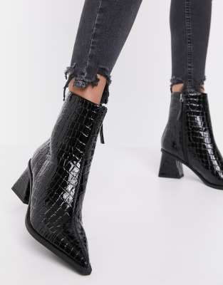 Topshop pointed heeled boots in black 