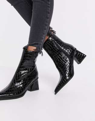 Topshop pointed heeled boots in black 