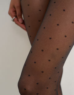 Model wearing Polka dot tights in black