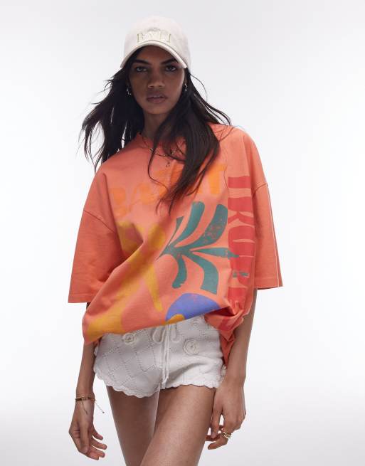 Topshop – Pomarańczowa koszulka oversize z grafiką Saint Tropez