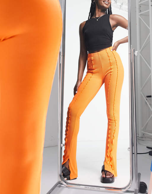 Topshop – Pomarańczowe obcisłe spodnie dzwony z widocznymi szwami, 4 z 4