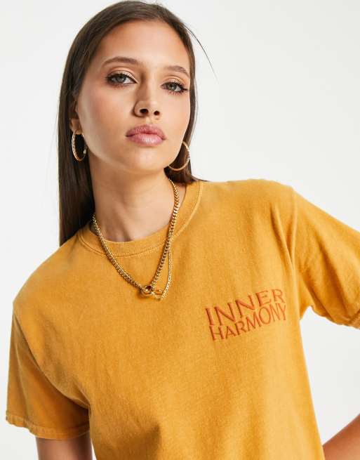 Topshop – Pomarańczowy T-shirt z grafiką „Inner Harmony”