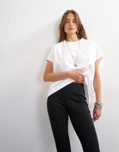 Model wearing Ponte capri leggings in black