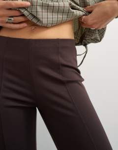 Model wearing Ponte capri leggings in chocolate